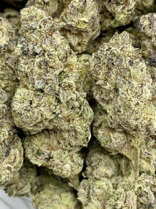 Donkey Butter Breath is an Indica dominant strain created by crossing Grease Monkey and Triple OG.
